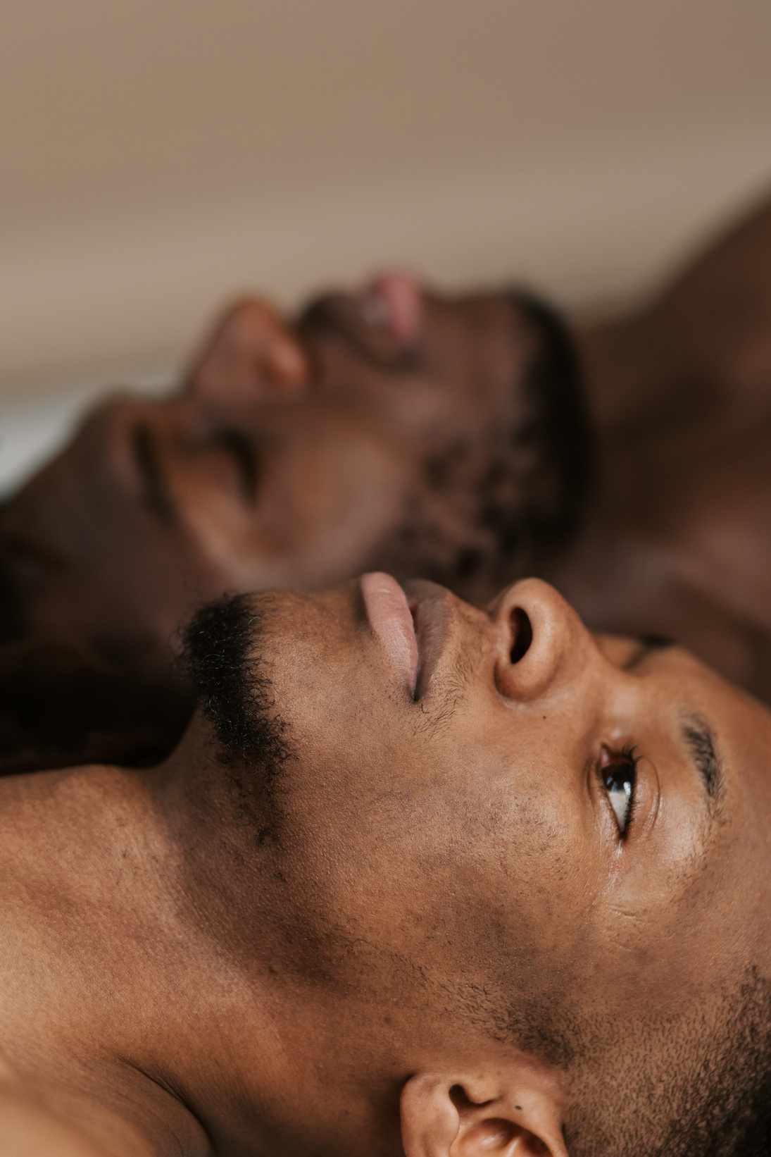 Men Lying Down